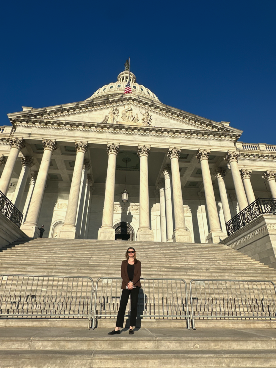 Danielle Newport Fancher standing on the steps of the United States Capitol